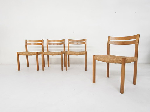 Set van vier eiken en sisal eetkamerstoelen model 401 van J.L Moller, Denemarken 1970's