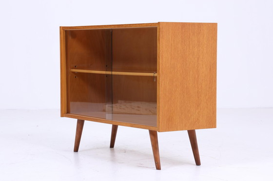 Image 1 of Vintage glazen ladekast 60s Mid Century vitrinekast hal console kast retro 70s hout bruin essenhout opslag