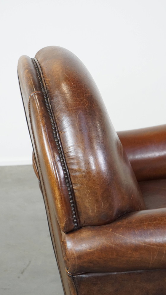 Image 1 of Donkere Schapenleren Armchair Op Wieltjes