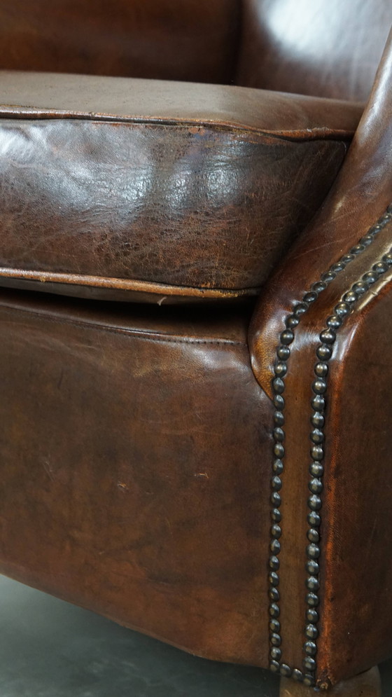 Image 1 of Donkere Schapenleren Armchair Op Wieltjes