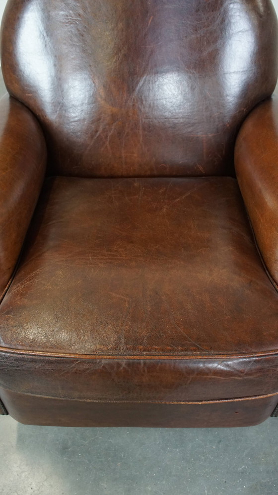 Image 1 of Donkere Schapenleren Armchair Op Wieltjes
