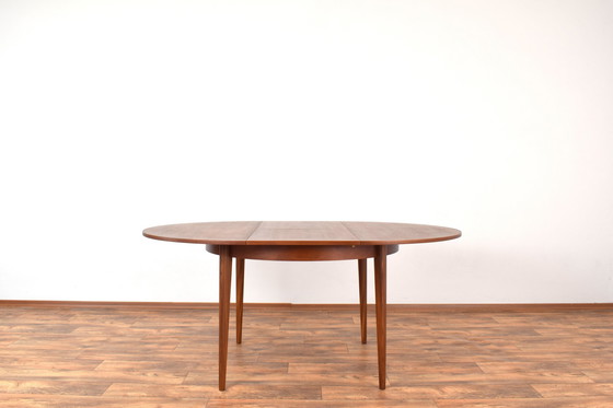 Image 1 of Mid Century Deense Teakhouten uitschuifbare eettafel, 1960S.