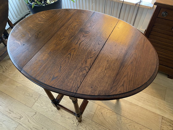Image 1 of Antieke Eiken Hangoor Tafel / Gateleg Table