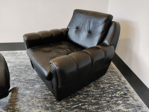 Clubfauteuil met poef, zwart leer