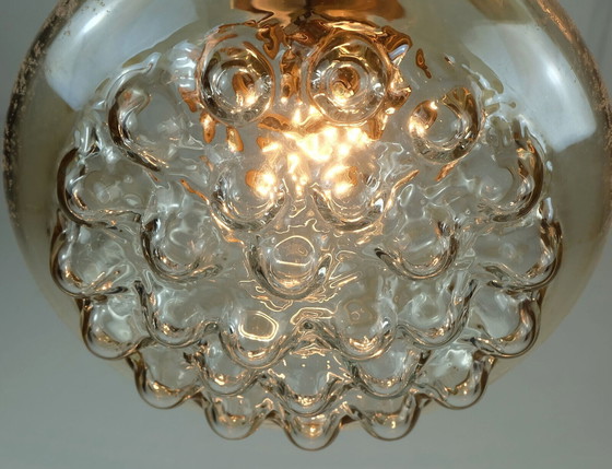 Image 1 of 1960's mid century HANGERLICHT bubbel amber glas en messing