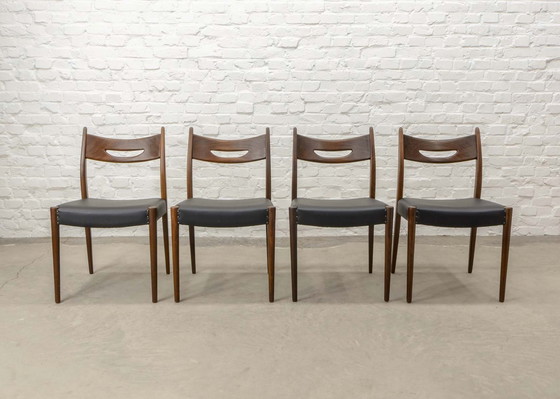 Image 1 of Set van vier eetkamerstoelen van teakhout en zwart kunstleer in de stijl van Webe, jaren 1960