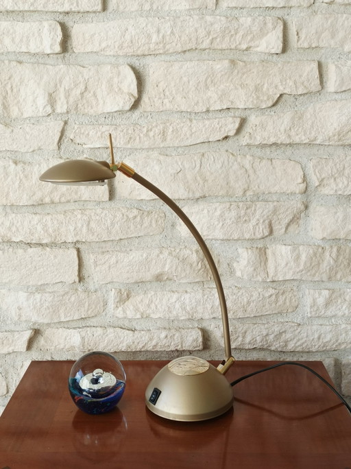 Verstelbare gouden lamp