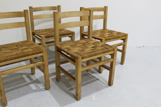 Image 1 of 4x Vintage houten, gevlochten eetkamerstoelen