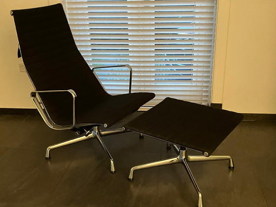 Image 1 of Vitra Eames Aluminium Stoel Stof Inclusief Hocker