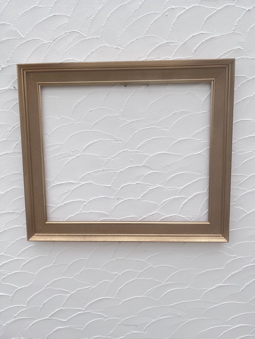 Licht gouden houten frame