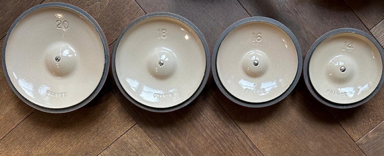 Image 1 of 4x Le Creuset geëmailleerde gietijzeren steelpan met houten handvat