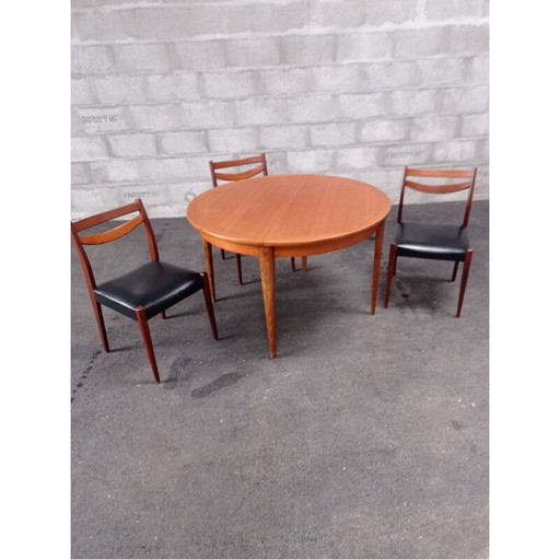 Vintage teakhouten tafel en stoelen, zwart kunstleer, jaren 1950