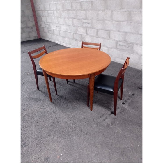 Image 1 of Vintage teakhouten tafel en stoelen, zwart kunstleer, jaren 1950