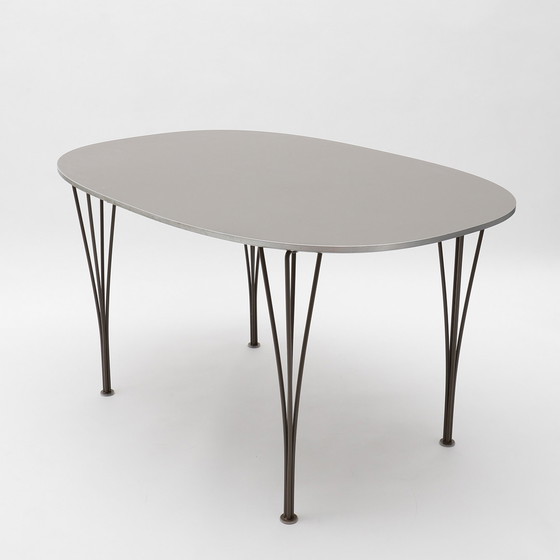 Image 1 of Fritz Hansen Denemarken Superellipse tafel Piet heim en Mathsson