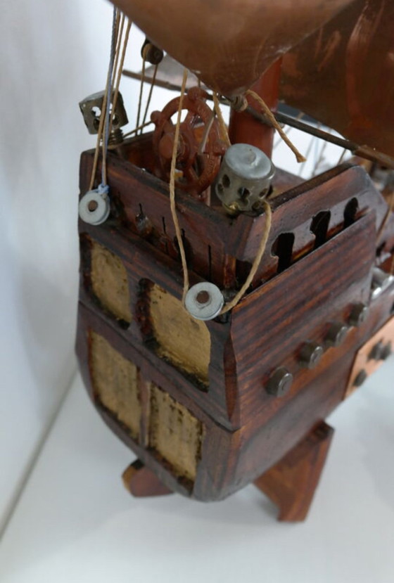 Image 1 of Vintage handgemaakte boot van exotisch hout en koper