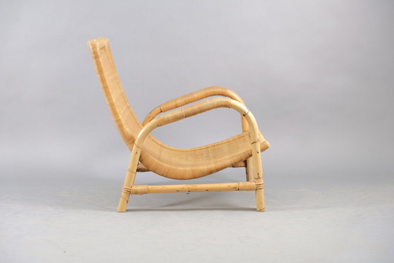 Image 1 of Arco rotan fauteuil