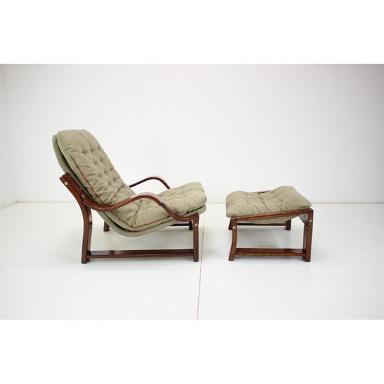 Image 1 of Scandinavische vintage fauteuil en voetenbank in hout en stof, jaren 1960