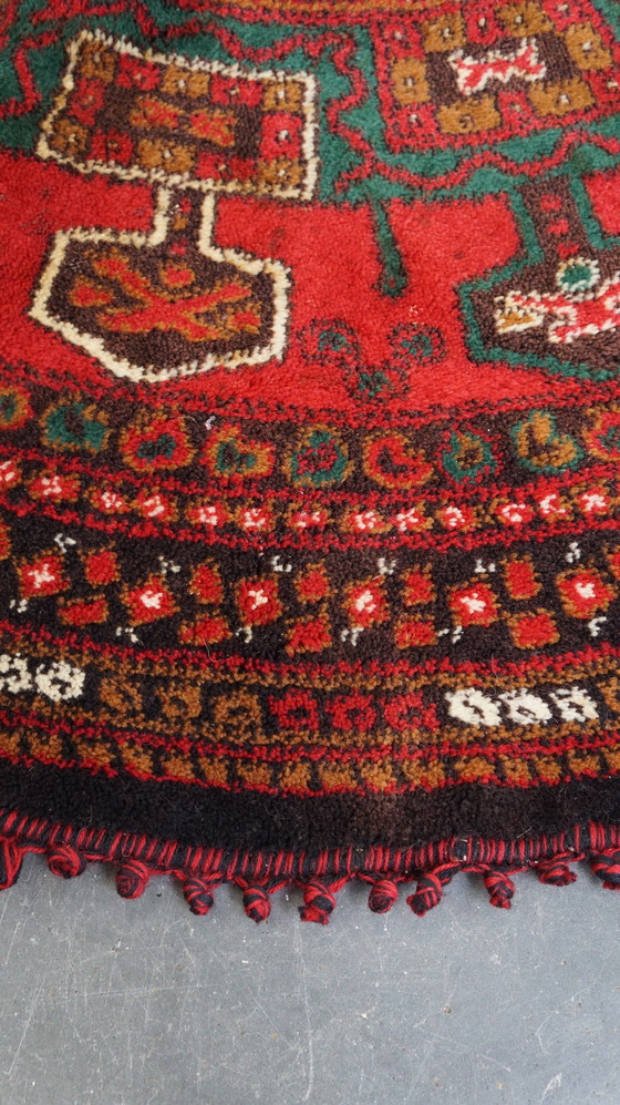 Image 1 of Rond vintage wollen vloerkleed met rood en geelbruine tinten 150x150cm