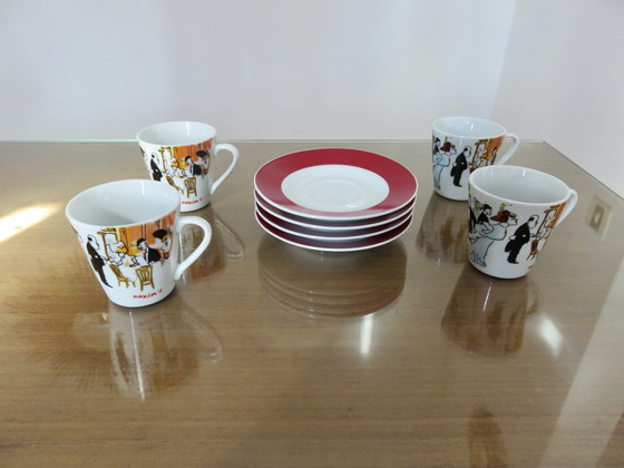 Image 1 of Set van 4 Maxim' De Paris koffiekoppen en onderzetters