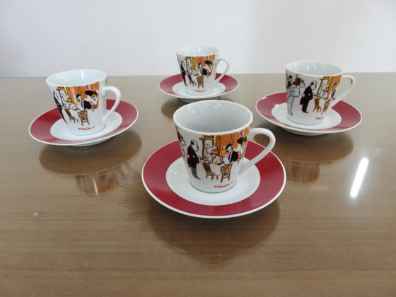 Image 1 of Set van 4 Maxim' De Paris koffiekoppen en onderzetters