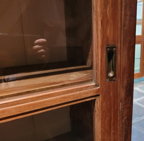 Image 1 of Antieke teak kast met schuifdeuren