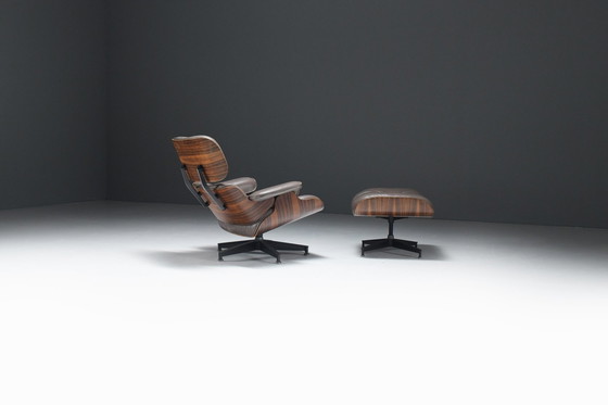 Image 1 of Vintage Eames Lounge Stoel & Ottoman In Baziliaans Rozenhout Door Ray & Charles Eames Voor Herman Miller