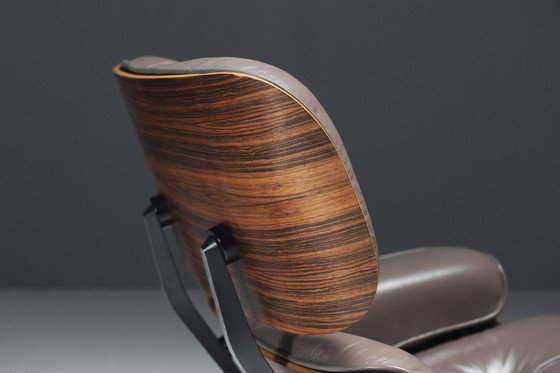 Image 1 of Vintage Eames Lounge Stoel & Ottoman In Baziliaans Rozenhout Door Ray & Charles Eames Voor Herman Miller