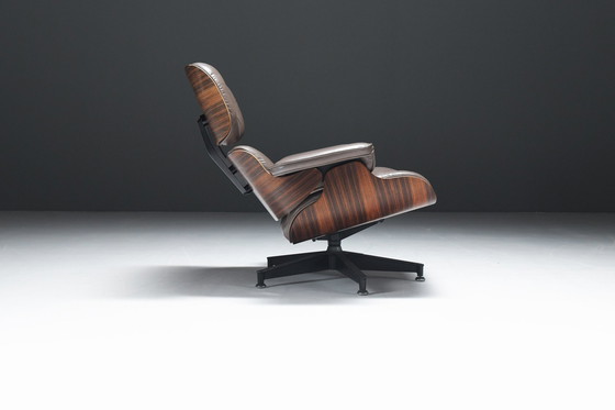 Image 1 of Vintage Eames Lounge Stoel & Ottoman In Baziliaans Rozenhout Door Ray & Charles Eames Voor Herman Miller