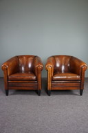 2x Vintage schapenleren clubfauteuils