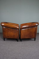 2x Vintage schapenleren clubfauteuils
