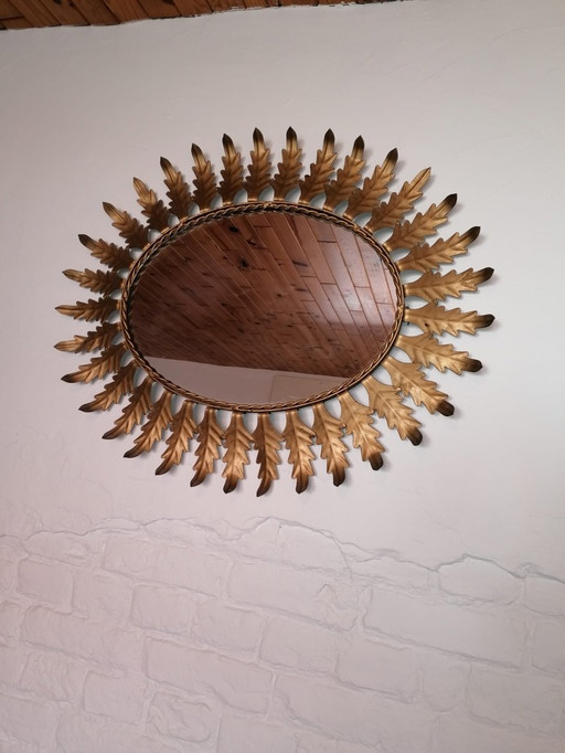 Vintage grote ovale sunburst spiegel