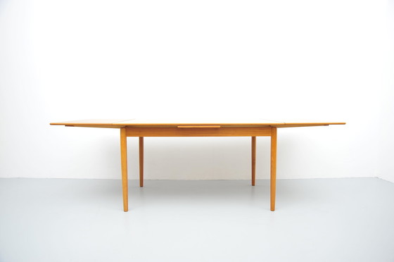 Image 1 of Vintage uitschuifbare eettafel in teakhout