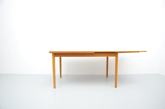 Image 1 of Vintage uitschuifbare eettafel in teakhout