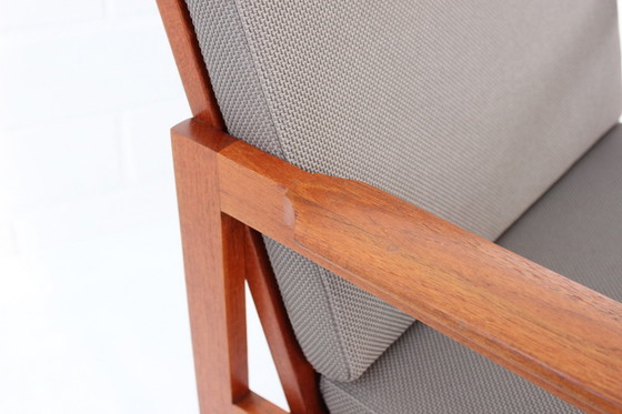 Image 1 of Illum Wikkelsø voor Niels Eilersen, 2x Deense "Capella" Teak Lounge Chair + 1x Kruk