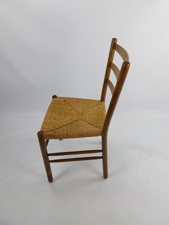 Image 1 of Set van 4 eetkamerstoelen uit het midden van de vorige eeuw door Hein Salomomson