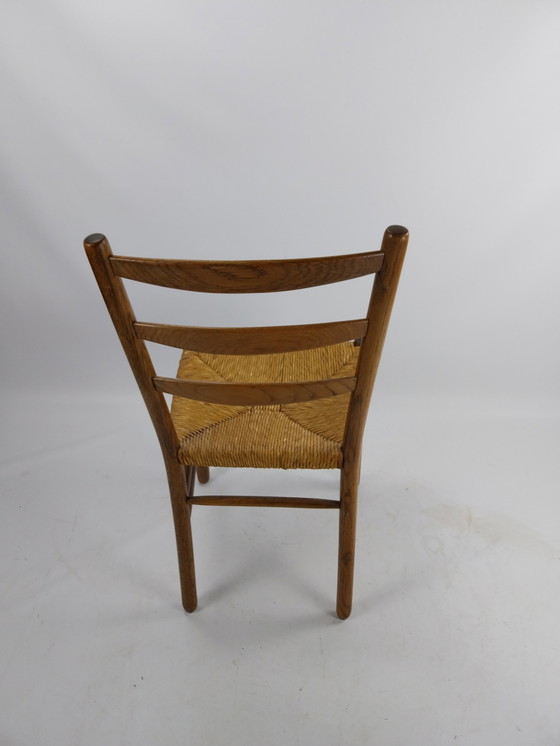 Image 1 of Set van 4 eetkamerstoelen uit het midden van de vorige eeuw door Hein Salomomson