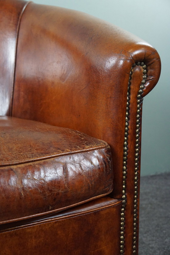 Image 1 of Schapenleren clubfauteuil in een warme cognac/ kastanje kleur