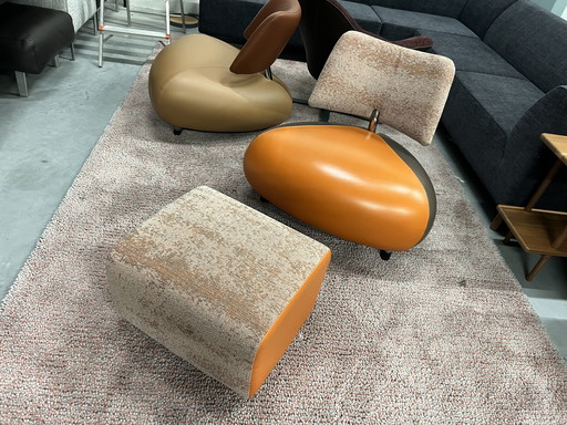 Leolux Pallone Fauteuil met hocker oranje bruin