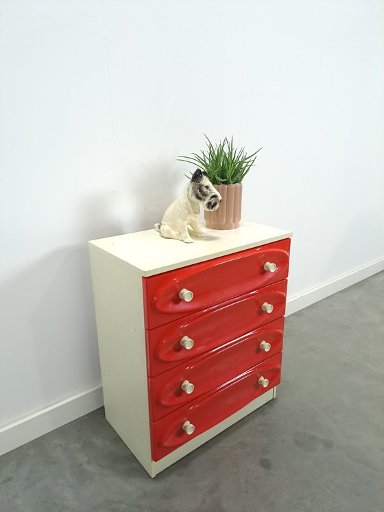 Image 1 of Vintage ladekast met rood roze kunststof lades 1970