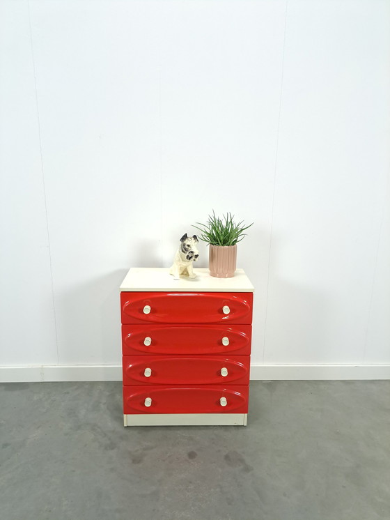 Image 1 of Vintage ladekast met rood roze kunststof lades 1970