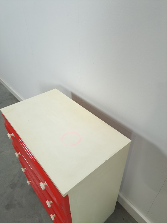 Image 1 of Vintage ladekast met rood roze kunststof lades 1970