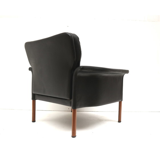 Image 1 of Zwart leren Deens design leren fauteuil ontworpen door Hans Olsen uit de jaren ’60.
