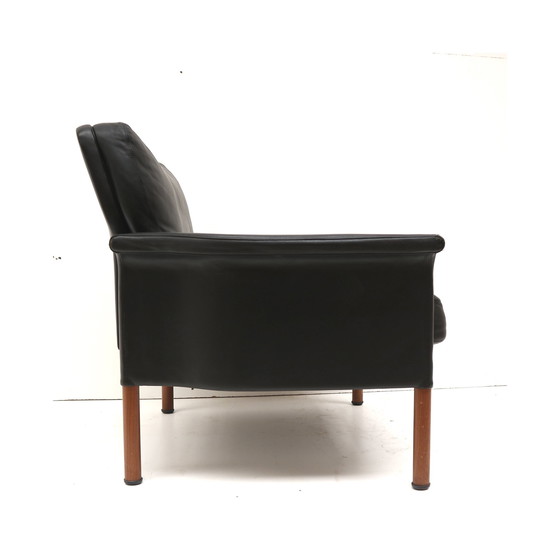 Image 1 of Zwart leren Deens design leren fauteuil ontworpen door Hans Olsen uit de jaren ’60.
