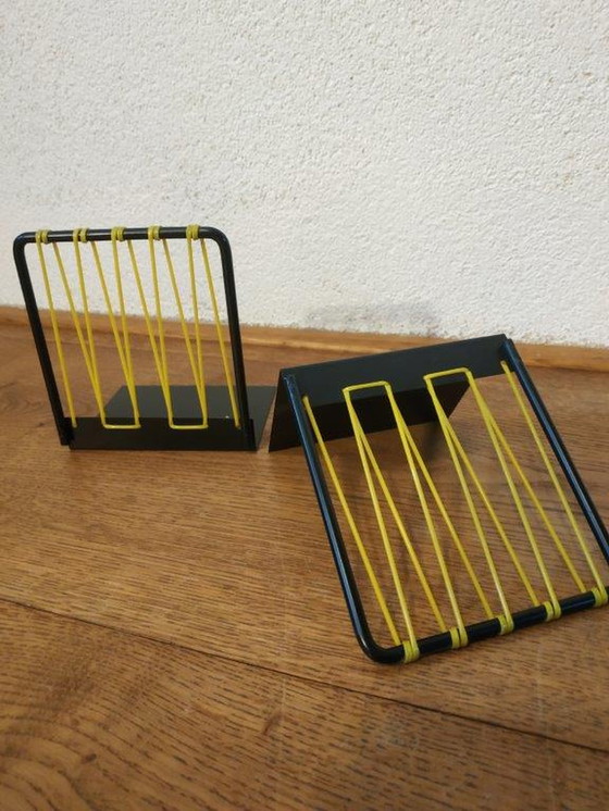 Image 1 of 2x Vintage metalen boekensteunen met nylon draad uit jaren 50/60