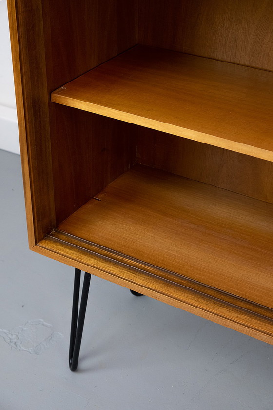 Image 1 of Vintage notenhouten Dressoirs met schuifdeuren, jaren 60