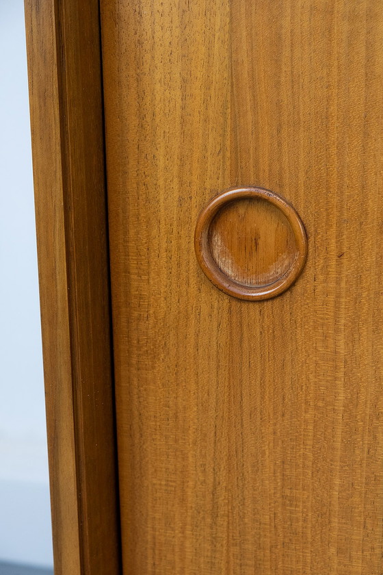 Image 1 of Vintage notenhouten Dressoirs met schuifdeuren, jaren 60