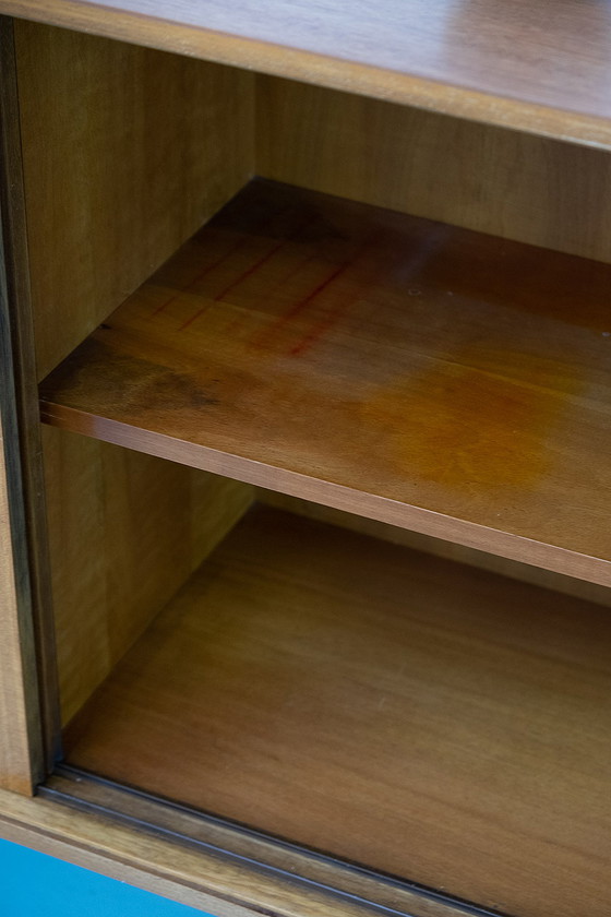 Image 1 of Vintage notenhouten Dressoirs met schuifdeuren, jaren 60