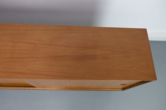 Image 1 of Vintage notenhouten Dressoirs met schuifdeuren, jaren 60