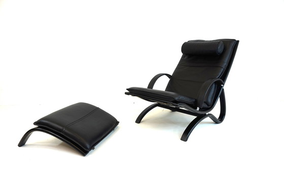 Image 1 of Nelo Zweden lederen fauteuil met poef