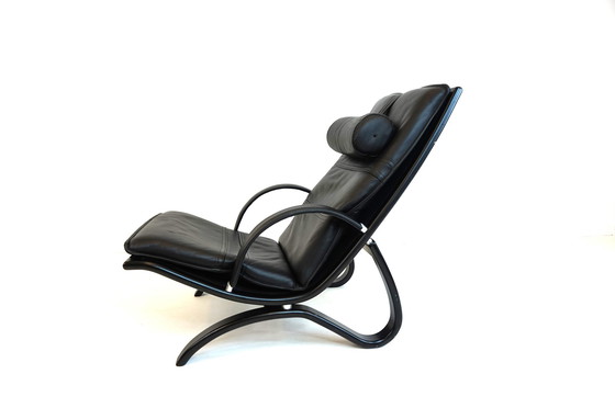 Image 1 of Nelo Zweden lederen fauteuil met poef